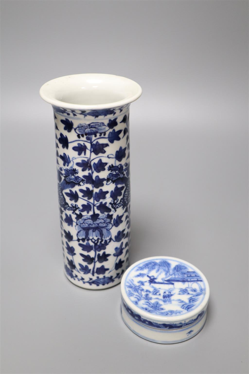 A Chinese blue and white seal paste box and cover, Yongzheng mark but 19th century, and a blue and white cylindrical dragon sleeve vase